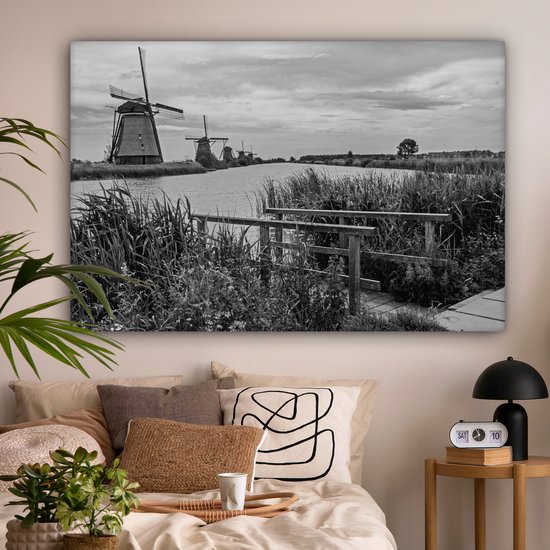 Photo Zwart et blanc des moulins à vent de Kinderdijk aux Nederland Toile 180x120 cm - Tirage photo sur toile (Décoration murale salon / chambre) XXL / Groot format!