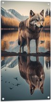 Tuinposter – Wolf in Landschap met Weerspiegeling in het Water - 50x100 cm Foto op Tuinposter (wanddecoratie voor buiten en binnen)