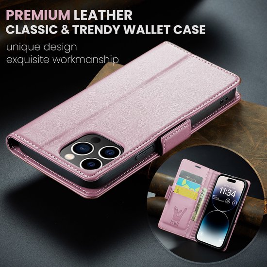 Étui portefeuille rose en similicuir, style livre, fermé, à côté d'un étui ouvert avec un téléphone.
