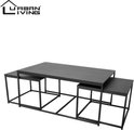 Trois tables basses noires, une grande rectangulaire et deux petites carrées, imbriquées.