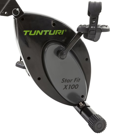 Detail van de zwarte trapas en het 'Tunturi Star Fit X100' logo op een hometrainer.