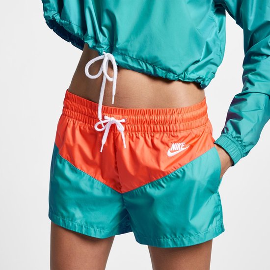 Nike Nsw Hrtg Short Woven Korte broek Dames - Cabana/Turf Orange/(White) -  Maat L | bol.com