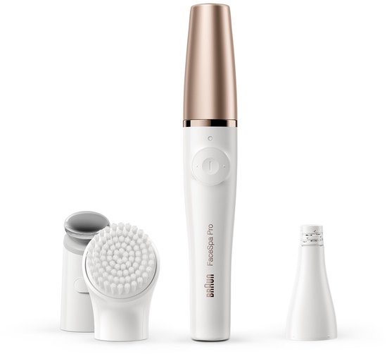 Witte Braun FaceSpa Pro epilator met rosegouden dop, drie opzetstukken op de achtergrond.