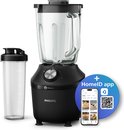 Zwarte Philips blender met glazen kan, bijbehorende smoothiebeker en een smartphone die de HomeID app toont.