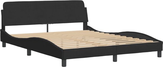 Cadre de lit rembourré noir avec tête de lit ondulée et sommier à lattes en bois.