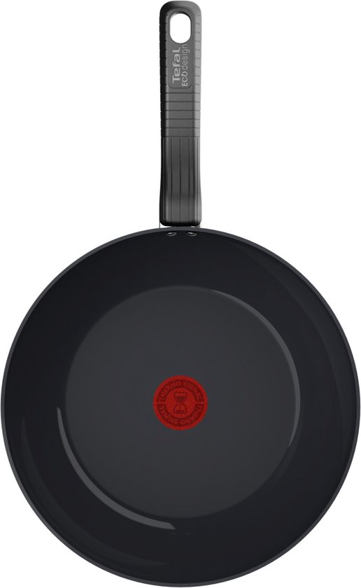 Wok Tefal noir, vu de dessus, avec un indicateur Thermo-Spot rouge au centre.
