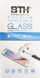 Verpakking van BTH Premium Tempered Glass screenprotector. Een hamer slaat op een smartphone met gehard glas erop.