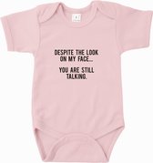 Baby rompertje Despite the look on my face…you are still talking | Korte mouw 50/56 Licht roze