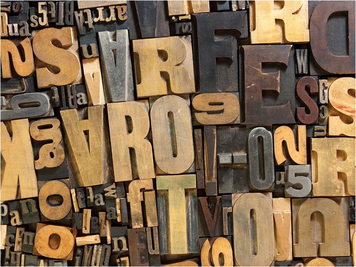 Fotobehang - Houten letters.