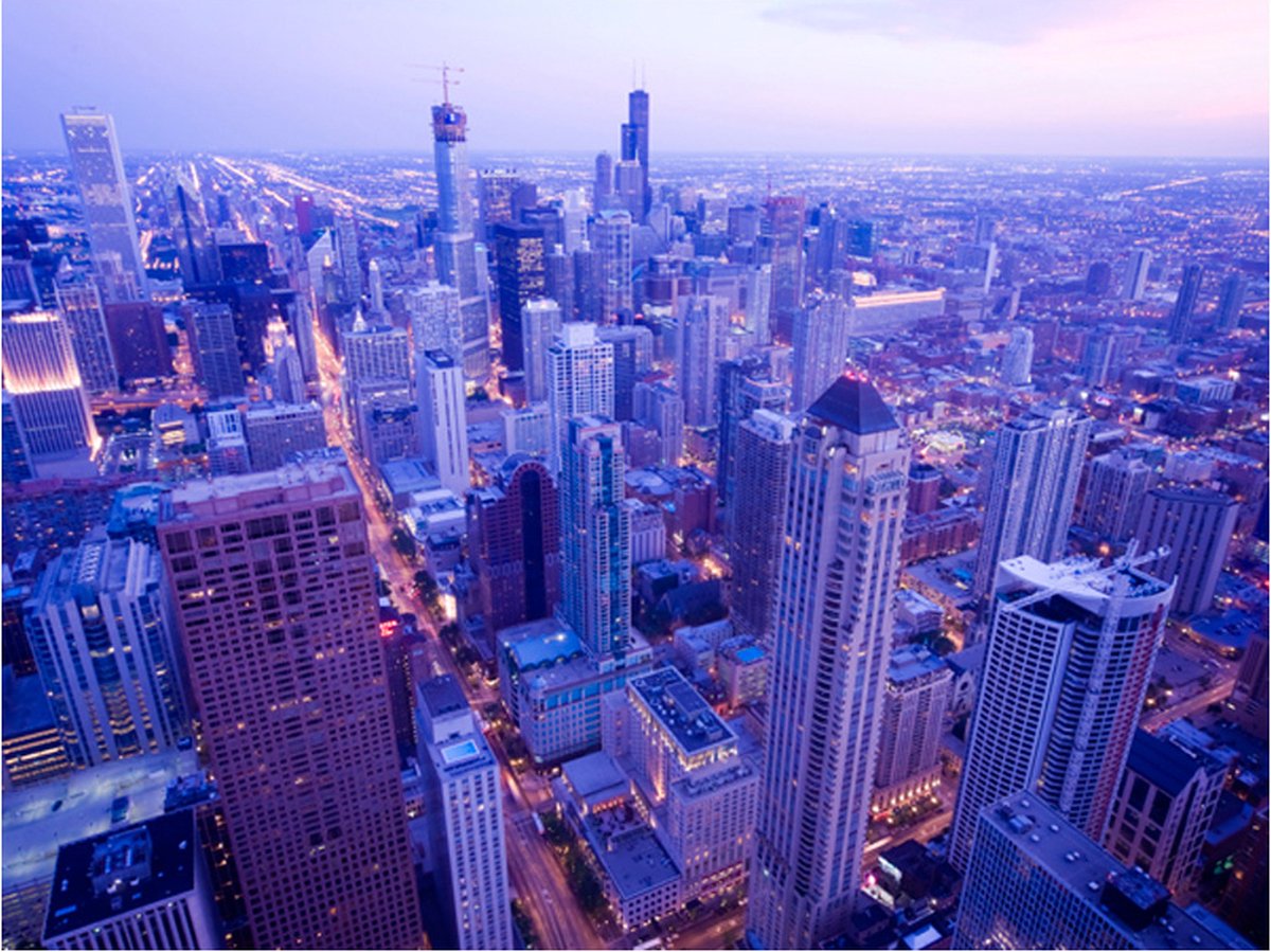 Fotobehang - Timide lichten in de schemering in Chicago.