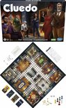 Cluedo speldoos en bordspel met personages, wapens, kaarten en dobbelstenen.