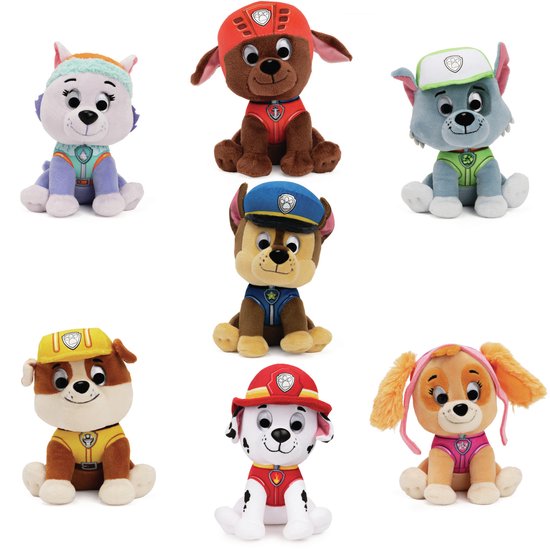 Een verzameling van zeven PAW Patrol knuffels in hun kenmerkende uniformen.