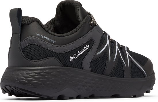 Zwarte Columbia wandelschoen, zijaanzicht, met grijze zigzag-accenten.