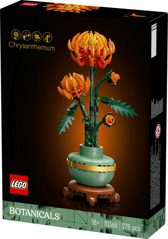Chrysanthème Lego dans un vase vert avec une bande dorée et un socle marron. Les fleurs sont orange et rouges.