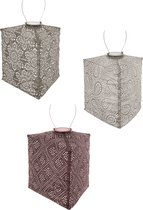 Set van drie lampionnen: grijs, lichtgrijs en bruin, met witte patronen.