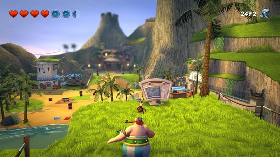 Obelix met schild in een tropische omgeving met een vulkaan op de achtergrond.