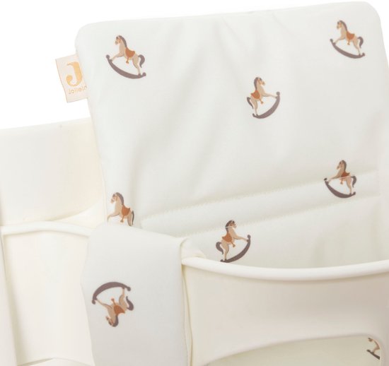 Witte stoelverkleiner met bruine wiebelpaardjes print. Jollein logo op een label.