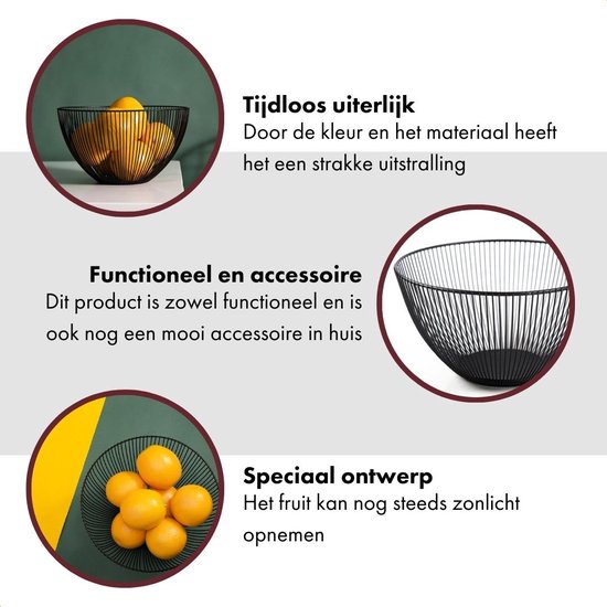 Zwarte metalen fruitschaal met verticale spijlen, gevuld met sinaasappels.