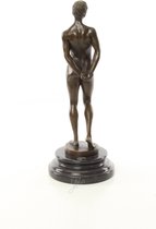 Bronzen beeld van een naakte poserende man, A MODERNIST BRONZE SCULPTURE OF A MALE NUDE