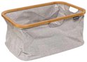 Grijze Brabantia wasmand met een bamboe frame en handvatten.