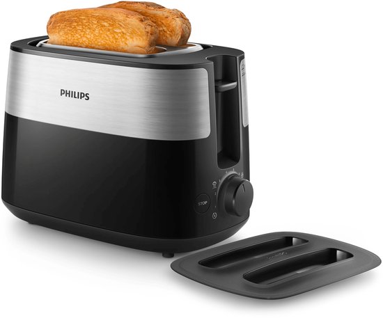 Zwarte Philips broodrooster met zilveren accenten, met twee geroosterde boterhammen erin en een losse kruimellade.