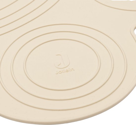 Crèmekleurige siliconen onderlegger met concentrische cirkels en het Jollein logo.