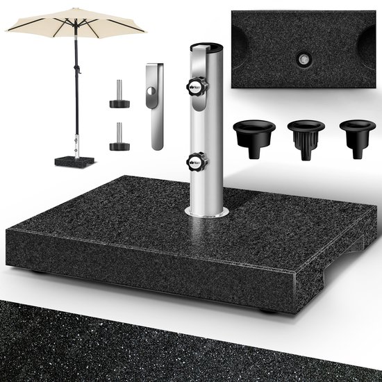 Een zware granieten parasolvoet met een zilveren paal in het midden, met adapters en schroeven ernaast.