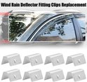 Set van acht zilverkleurige windafwijsclips voor auto's.
