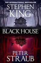 Boekomslag van 'Black House' door Stephen King en Peter Straub, met een spookhuis en een spiegelbeeld.