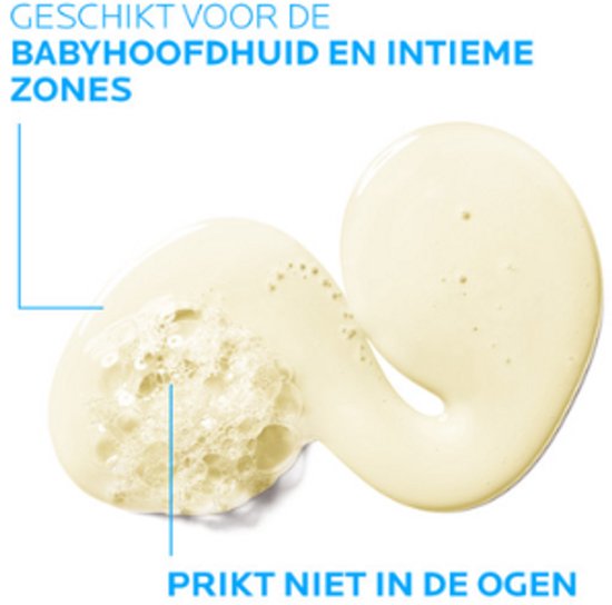 Kleine schelp van gele reinigingsolie met schuim, met tekst "Geschikt voor de babyhoofdhuid en intieme zones", "Prikkt niet in de ogen".