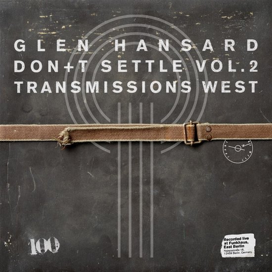 Glen Hansard - Don't Settle Vol. 2 Transmissions West, opgenomen live in Funkhaus, Oost-Berlijn. De hoes heeft een donkere, verweerde textuur met witte tekst en een bruine band.