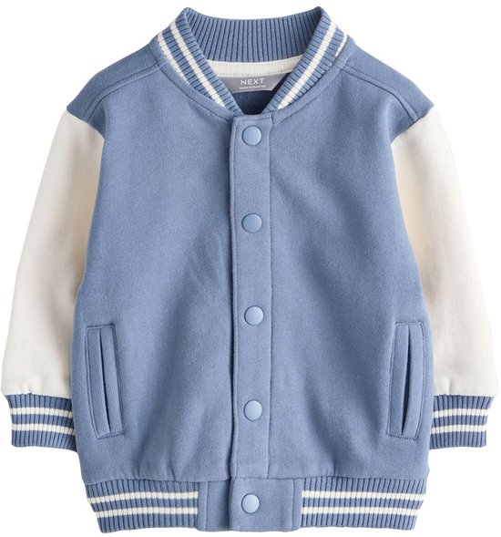 Blauw-wit bomberjack met knoopsluiting en 'Next' label in de kraag.