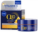 Nivea Q10 Energy nachtcrème pot en doosje met sinaasappelpartjes.