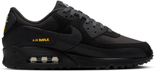 Zwarte Nike Air Max 90 sneaker met zichtbare luchtkussentjes en gele details.