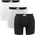 Drie Adidas boxershorts: zwart, grijs en wit, met zwarte band en Adidas logo.