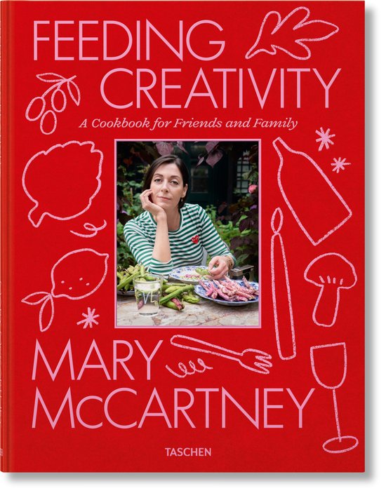 Boek 'Feeding Creativity' van Mary McCartney, met een vrouw die aan tafel zit, omringd door illustraties van eten.