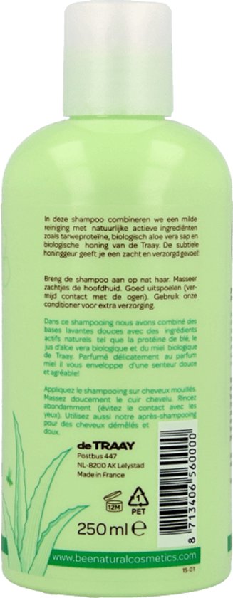 Achterkant lichtgroene fles shampoo met productinformatie. Tekst in het Nederlands en Frans.