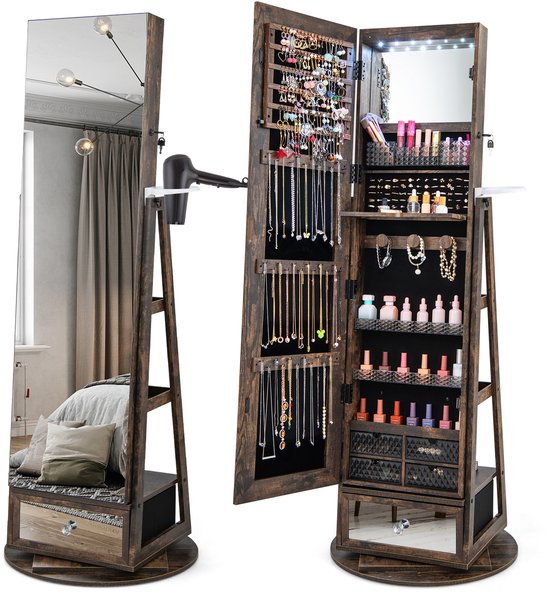 Houten staande spiegelkast, gedeeltelijk geopend met sieraden en make-up, naast een staande spiegel met haardroger.