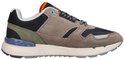 Zijaanzicht van de rechter sneaker in beige suède en zwart mesh, met groene hiel en G-Star label op de tong.