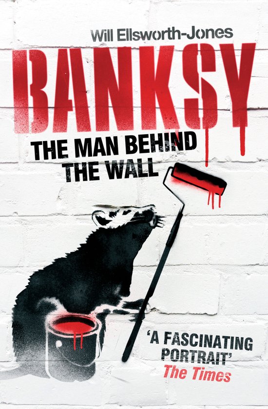 Boekomslag met de tekst "BANKSY THE MAN BEHIND THE WALL". Een zwarte rat schildert met rode verf op een witte bakstenen muur.