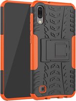 Schokbestendige pc + TPU-bandenpatroonbehuizing voor Galaxy M10, met houder (oranje)