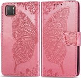 Voor Huawei Y5P vlinder liefde bloem reliëf horizontale flip lederen tas met beugel / kaartsleuf / portemonnee / lanyard (roze)