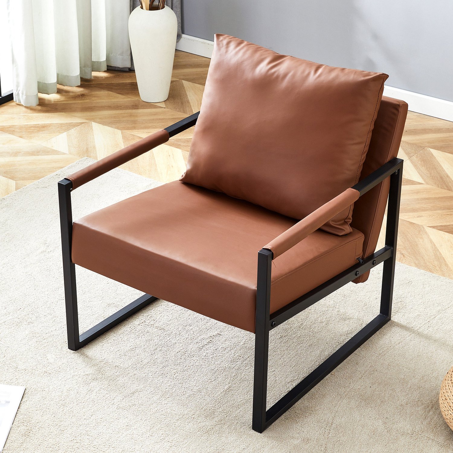 MEUNIQ Fauteuil in bruin kunstleer met zwart metalen frame, gevoerde zitting en rugleuning, armleuningen, leesfauteuil voor woonkamer of slaapkamer