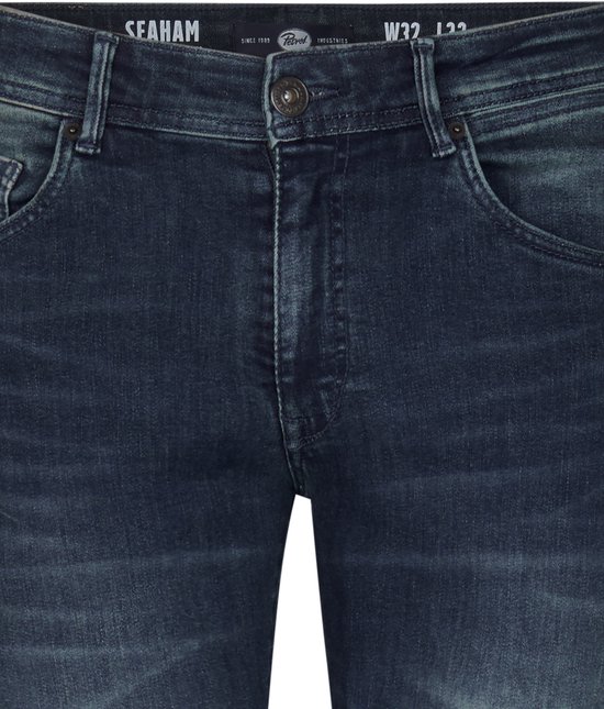 Donkerblauwe Petrol Industries Seaham slim fit jeans met subtiele wassing en knoopsluiting.