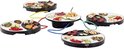 Princess Dinner4All gourmetset met vier zwarte units, witte borden en kleurrijke verbindingskabels met rauwe ingrediënten.