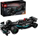 Zwarte LEGO Technic Mercedes-AMG F1 W14 raceauto met groene accenten, naast de productdoos.