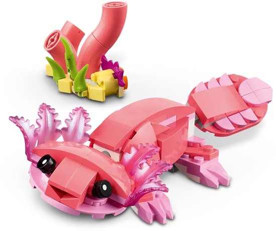 Een roze LEGO Creator axolotl met koraal en planten.