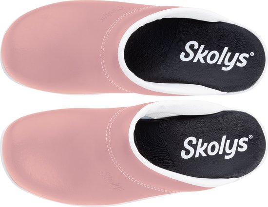 Bovenkant roze Skolys klompen met witte voering en zwarte binnenzool met Skolys logo.