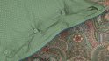 Groen dekbedovertrek met een stippenprint en een gedetailleerde paisley print.