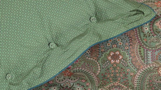 Groen dekbedovertrek met een stippenprint en een gedetailleerde paisley print.